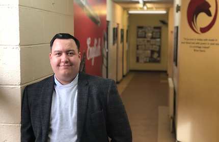 Headshot of Callum Williams in corridor