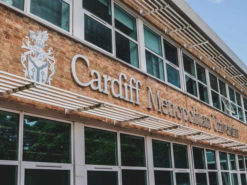 Exterior shot of Cardiff Metropolitan University's new building, highlighting its contemporary architecture and integration with the campus environment.