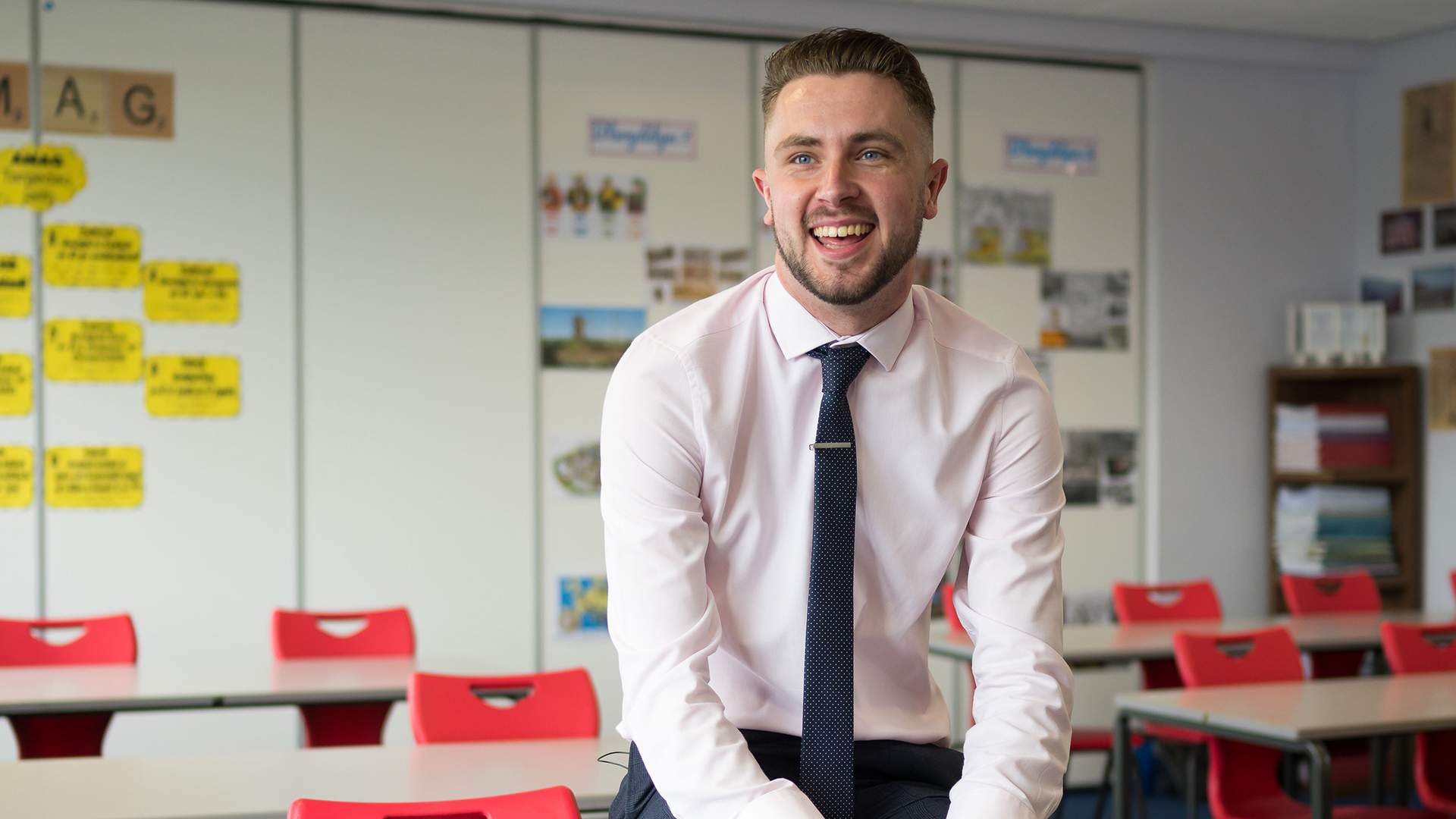 Student teacher photographed in their classroom