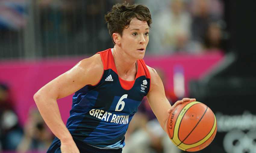 Stef Collins dribbles a basketball during a game for Team GB